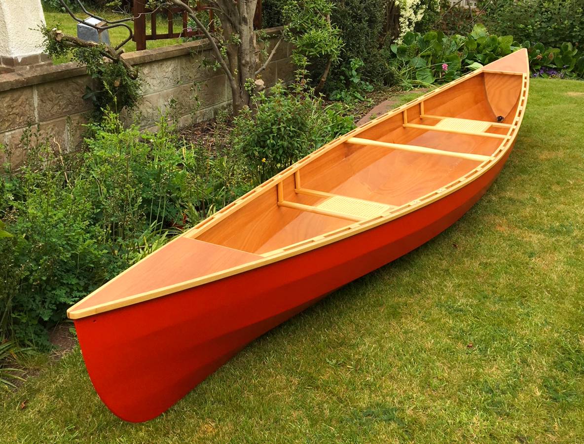 A well-finished Canadian canoe with standard broken inwales and optional seats