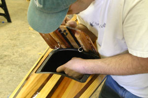 Securing the kayak hatch using the hidden internal hooks and shock cord