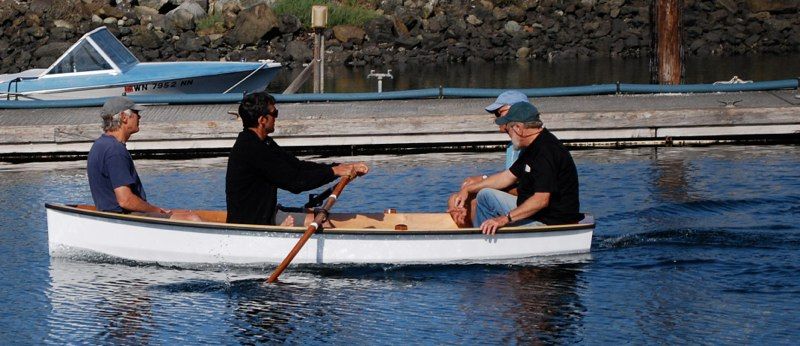 Rowing the PT 11 dinghy with four people aboard